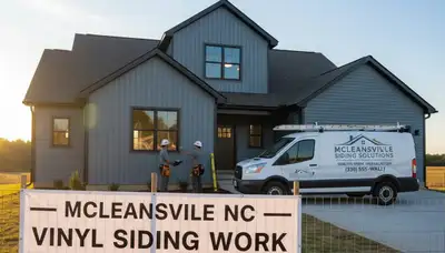Professional vinyl siding installation on home exterior in Greensboro NC