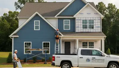 Professional vinyl siding installation on home exterior in Greensboro, NC