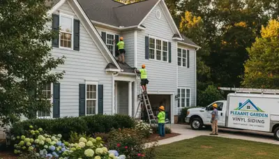 Professional vinyl siding installation on home exterior in Greensboro, NC